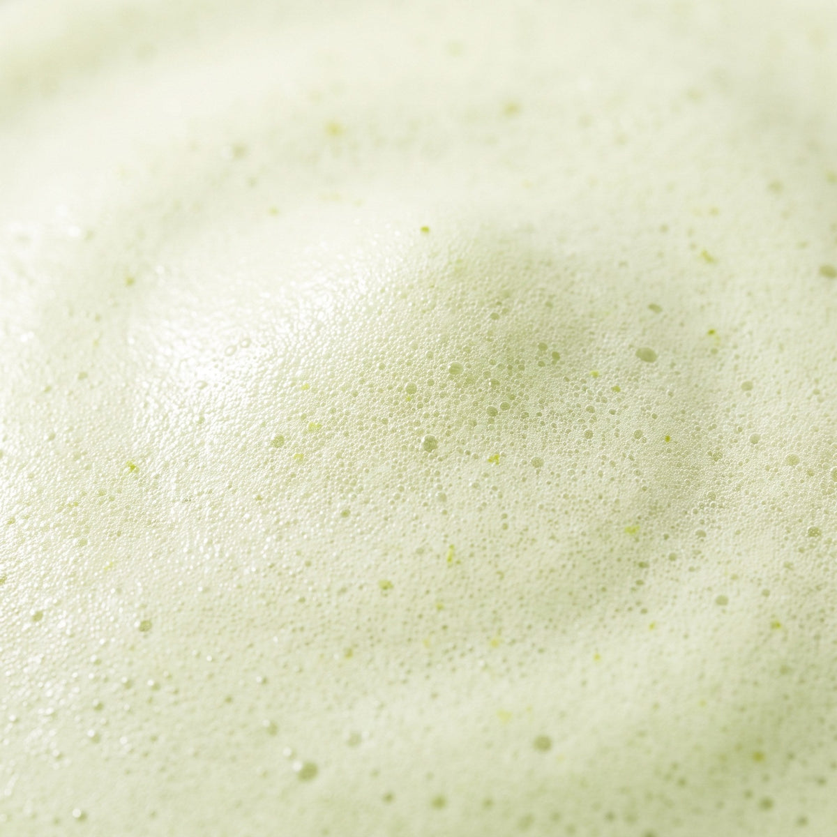 Dense pale green cleansing foam
