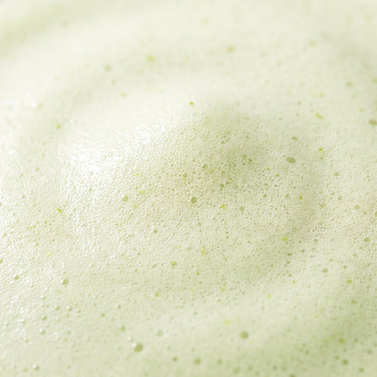 Dense pale green cleansing foam