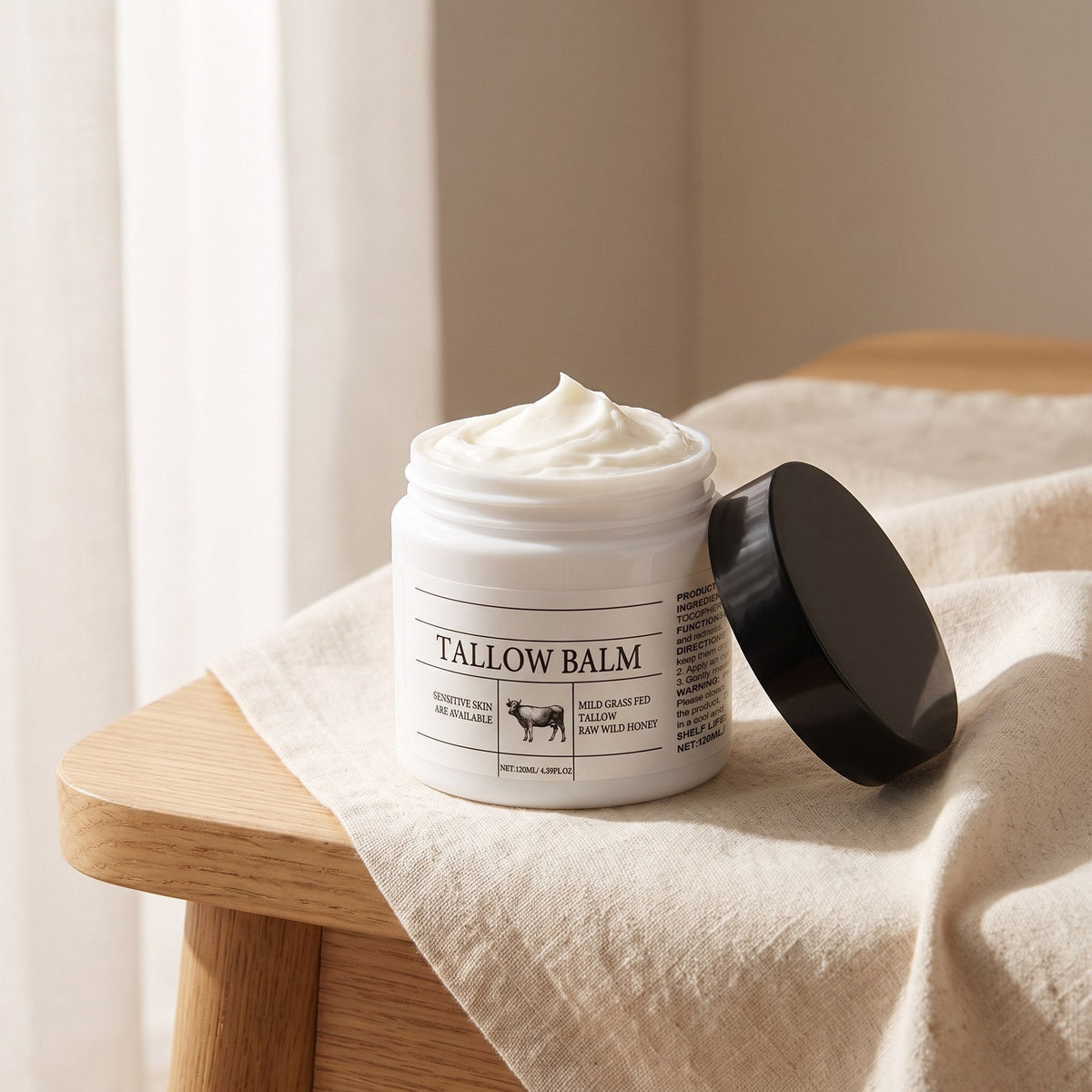 Tallow Balm jar, open, on linen